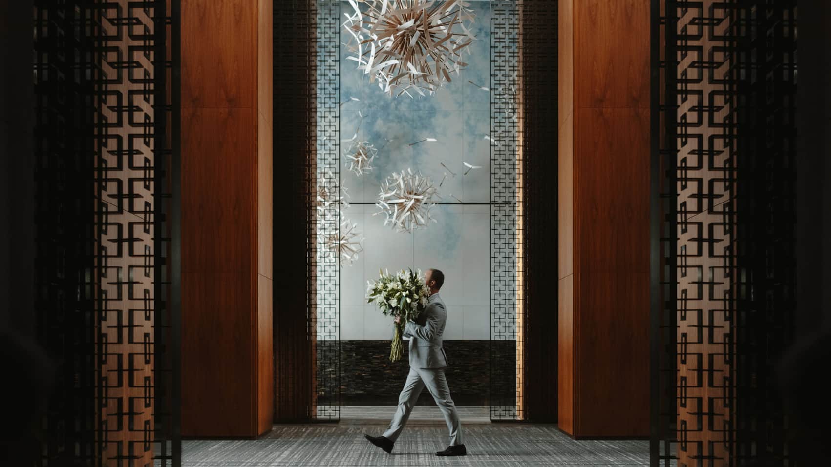 Four Seasons hotel lobby — the brand earns guest loyalty through personalised recognition rather than a points program