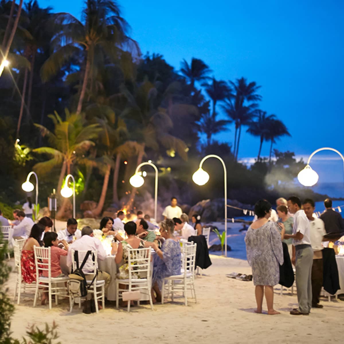 Koh Samui Destination Wedding Four Seasons Resort For The Reception At Dusk White Lanterns And Purple Lighting Create A Magical Atmosphere
