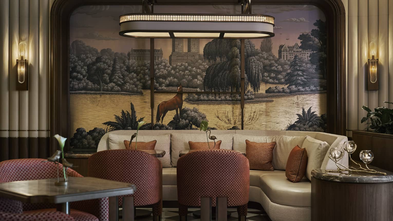 env: Lounge seating with mural