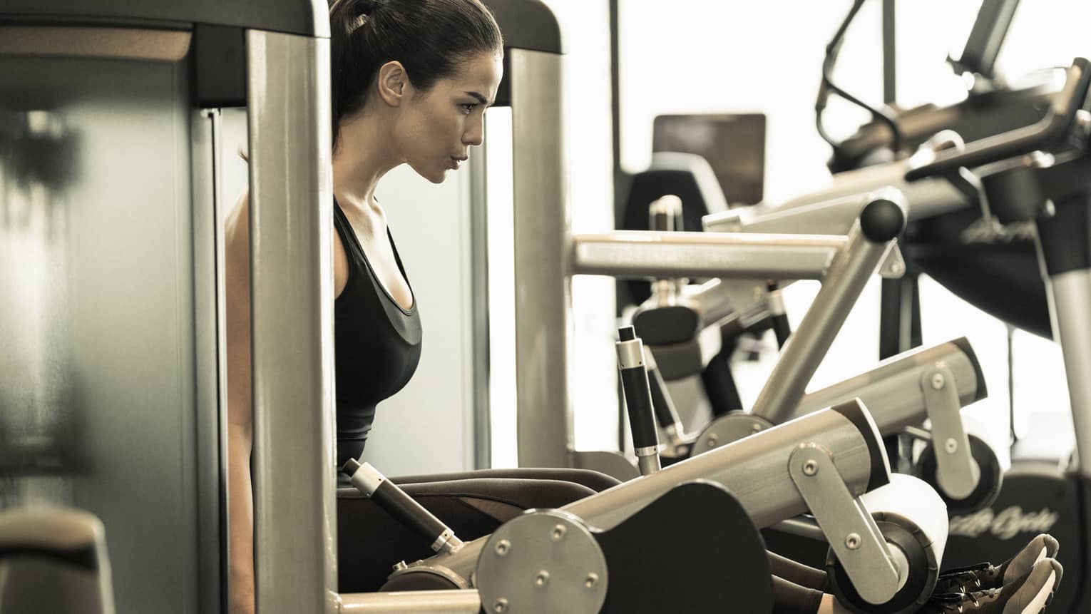 The gym at Four Seasons Hotel Kuala Lumpur features a variety of weight-training equipment
