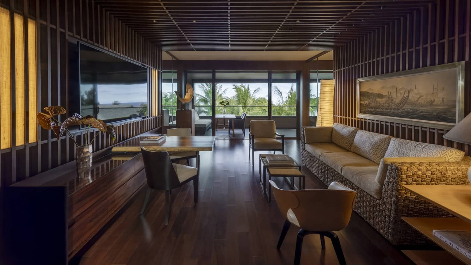 Living area with dark-wood floors, penthouse suite at Four Seasons Resort Lanai