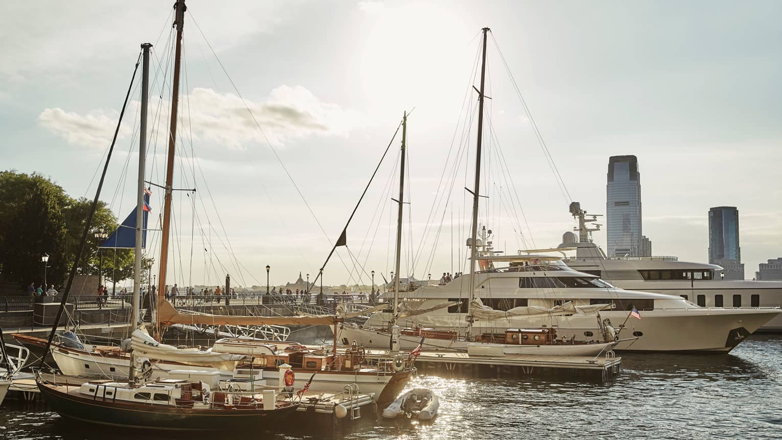 Boats, yachts parked in sunny New York City harbour
