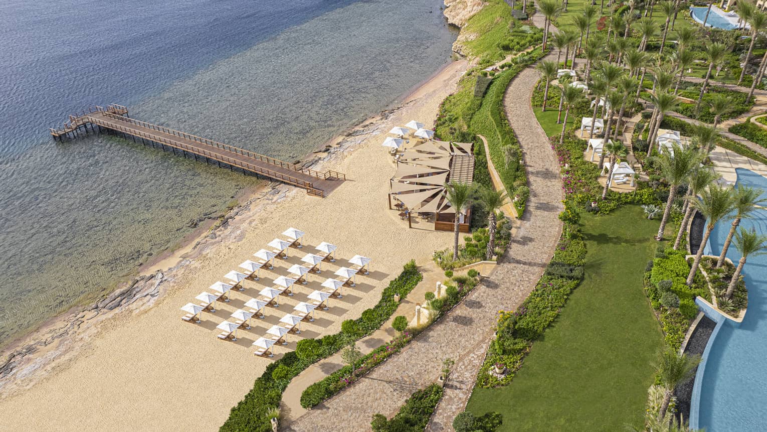 birds eye view of beach resort and luxury swimming facilities