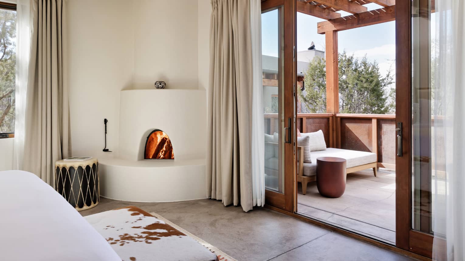 Hotel room with walk-out private terrace with pergola at Four Seasons Resort Santa Fe