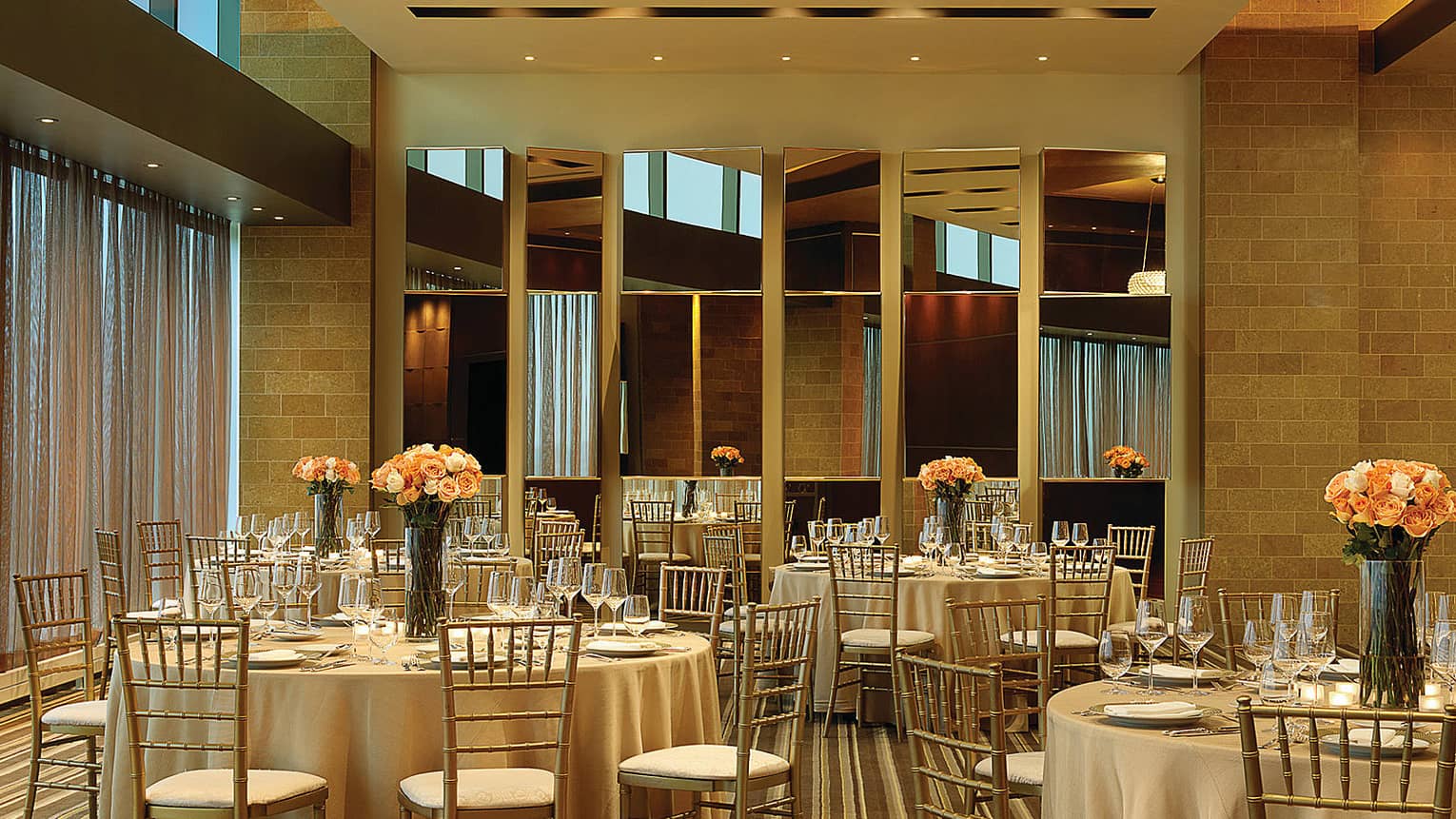 Mississippi Room ballroom banquet dining tables with pink flowers 