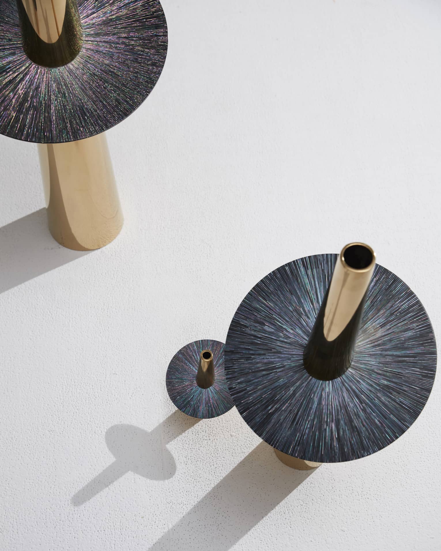 Circular artwork with a kaleidoscope of colours.
