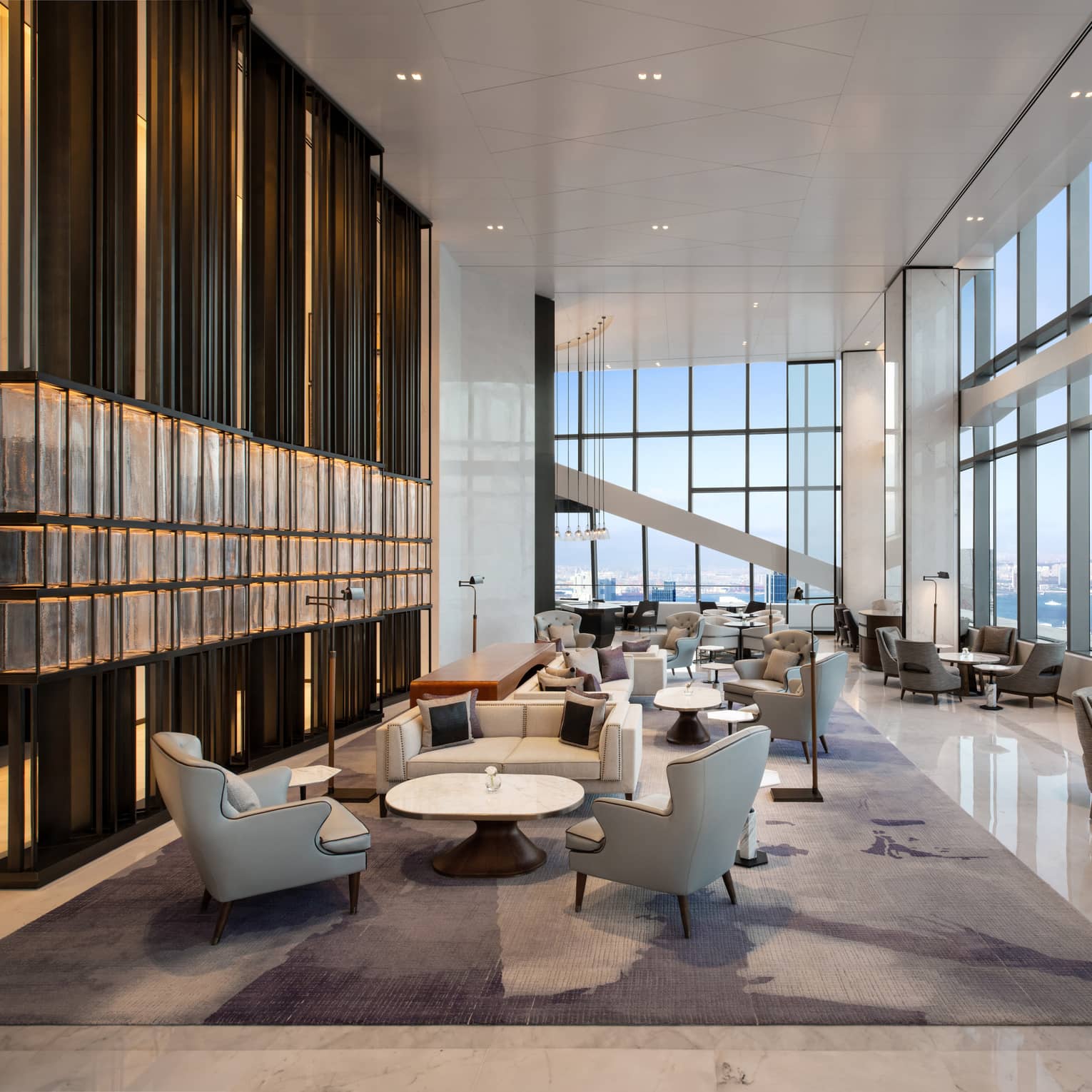 Hotel lounge with water view at Four Seasons Hotel Dalian