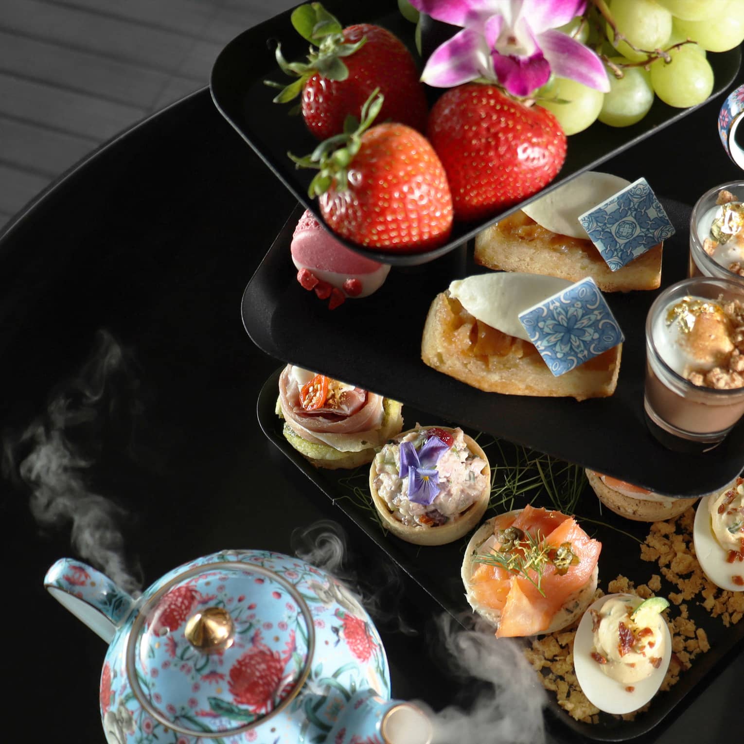 A colourful afternoon tea set.