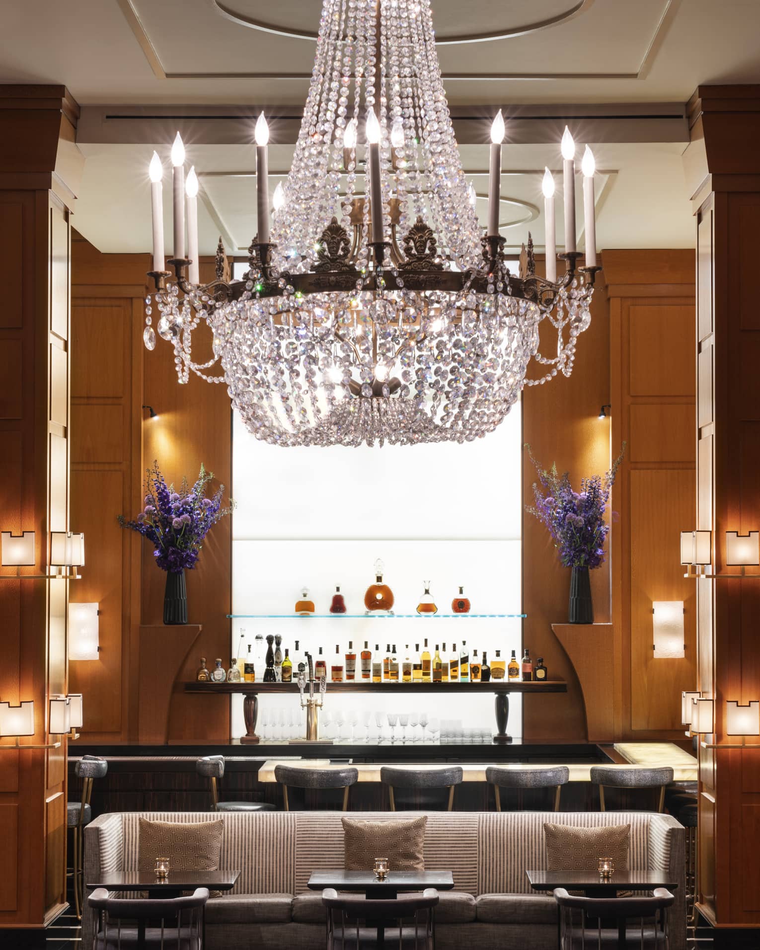 Indoor hotel bar with large crystal chandelier