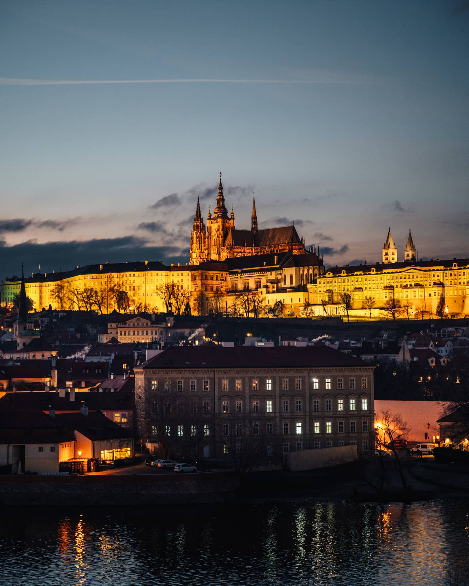 Prague Castle illuminated at dusk