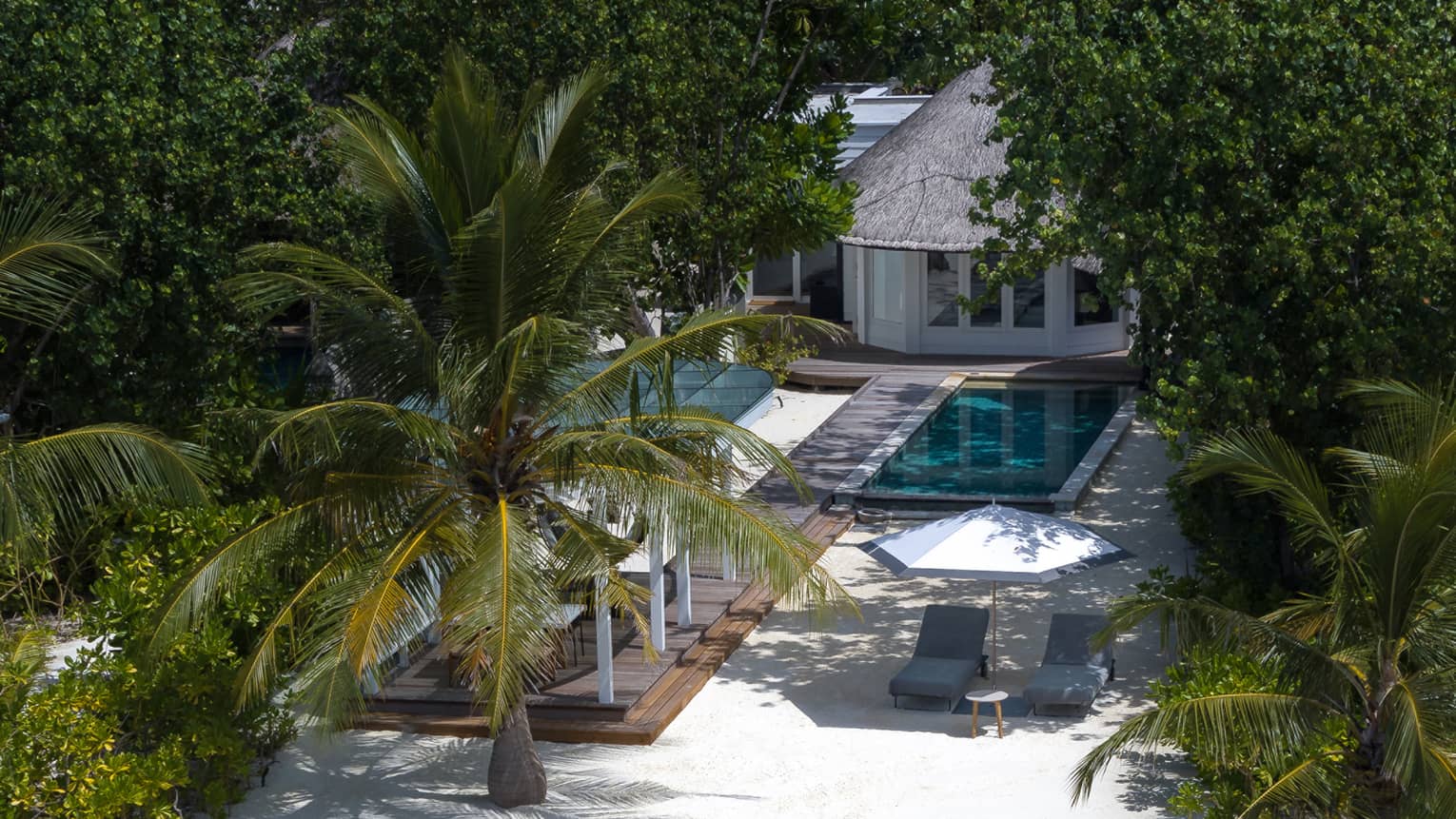 Aerial view of sunrise family beach villa 