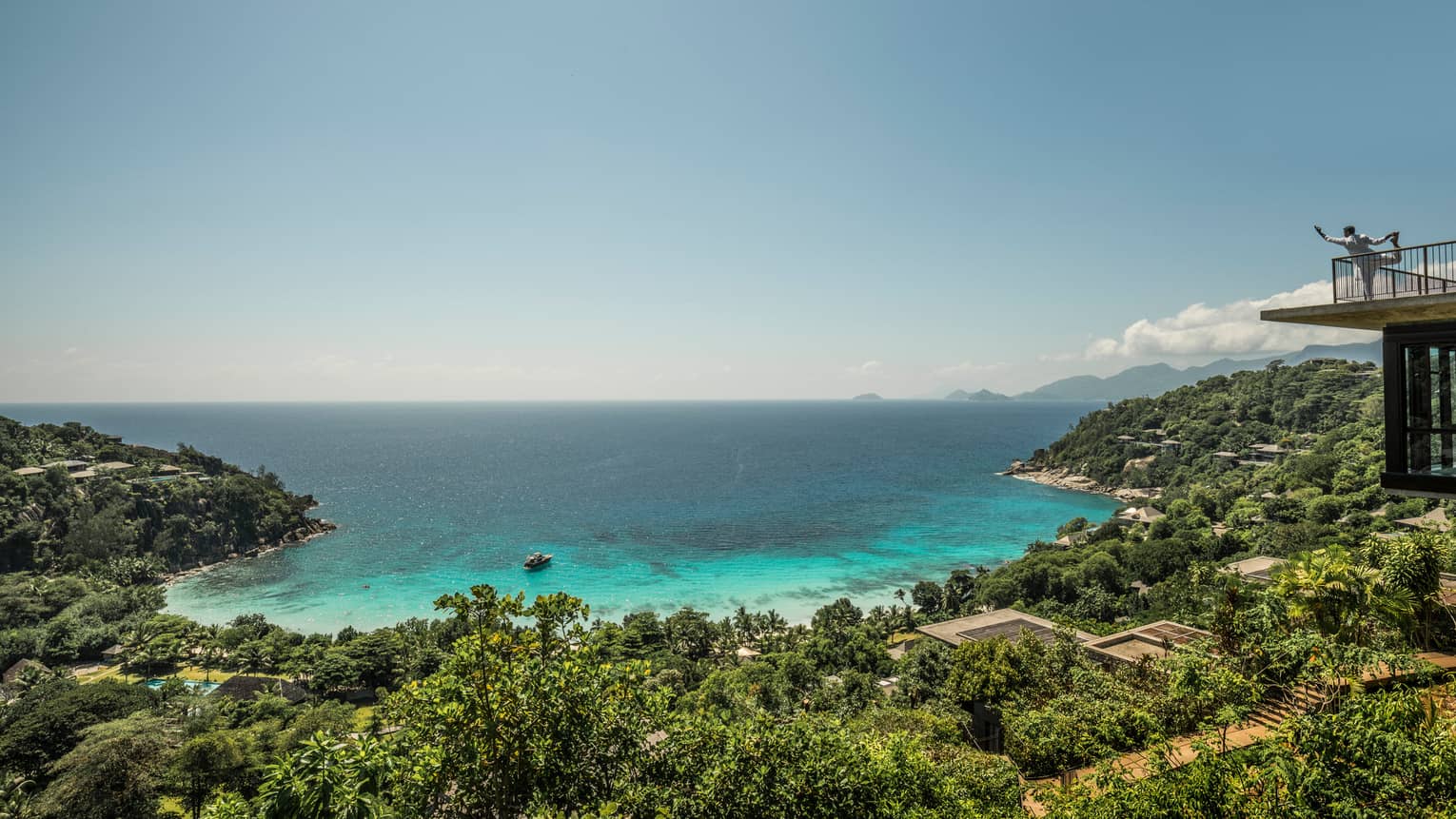 Aerial view of resort tropical forest and turquoise lagoon