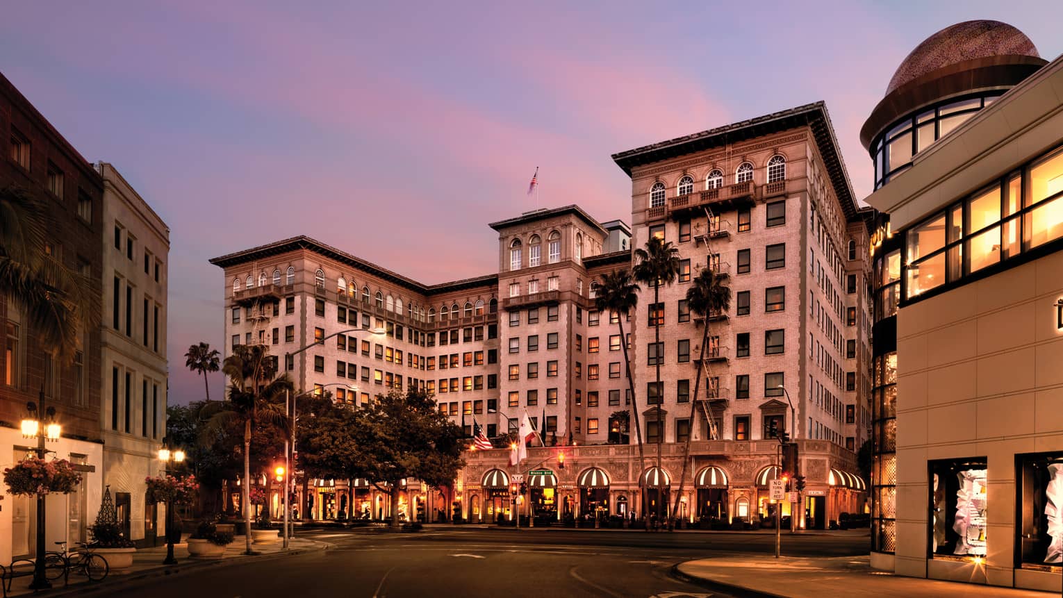 Beverly Wilshire, A Four Seasons Hotel building exterior, entrance at sunset