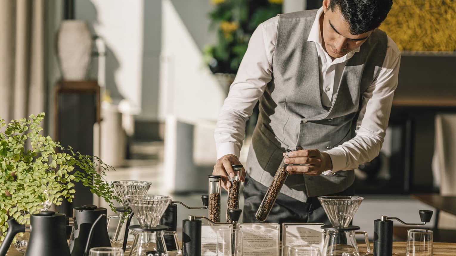 Craftsperson prepares Thai drip coffee