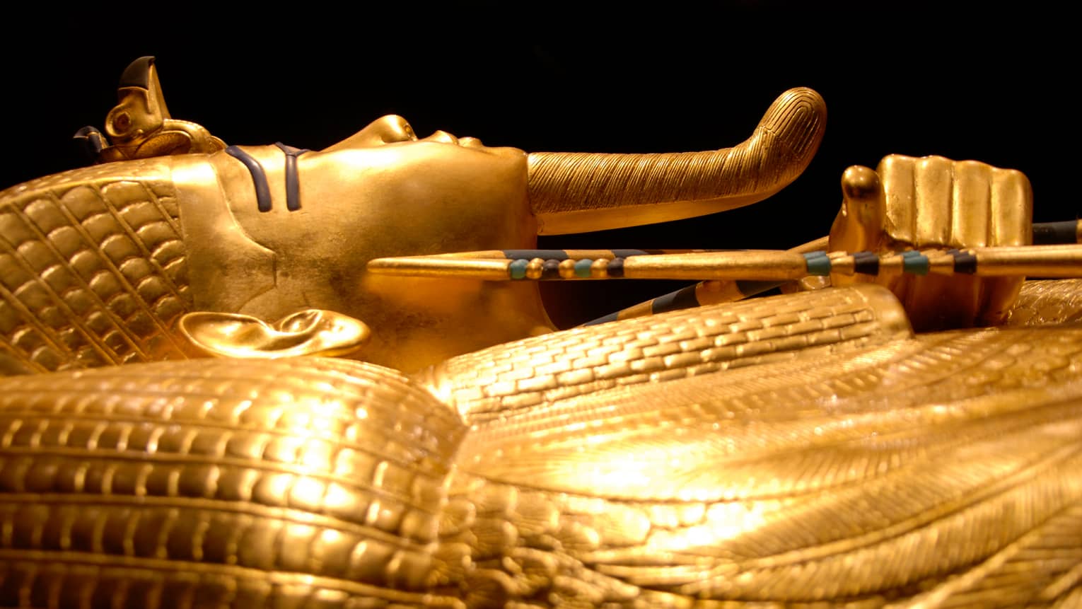 Side view of gold Pharaoh King Tutankhamun tomb in Cairo Egyptian Museum