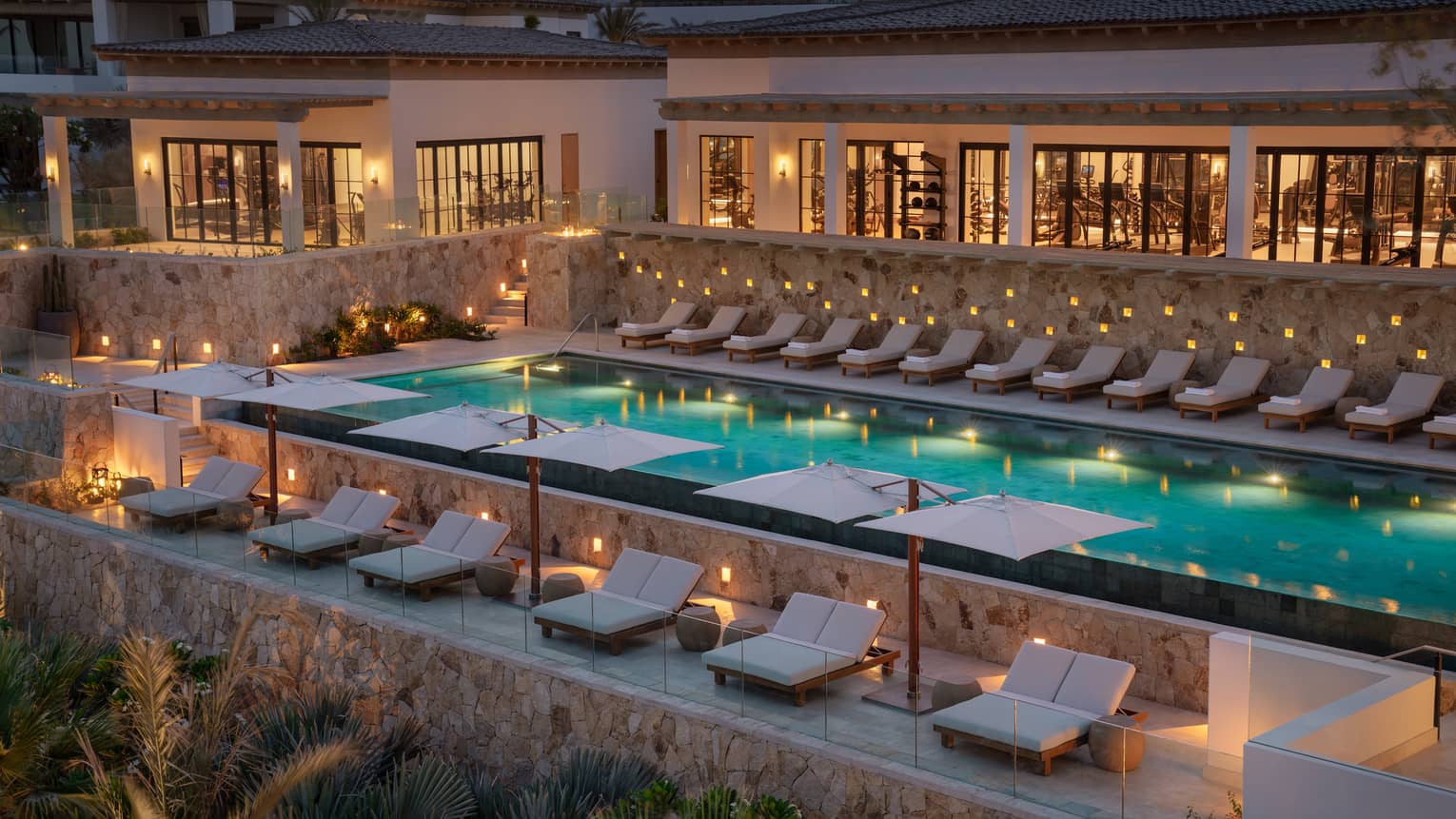 Outdoor swimming pool outside a fitness centre at luxury Four Seasons Resort Cabo San Lucas at Cabo Del Sol