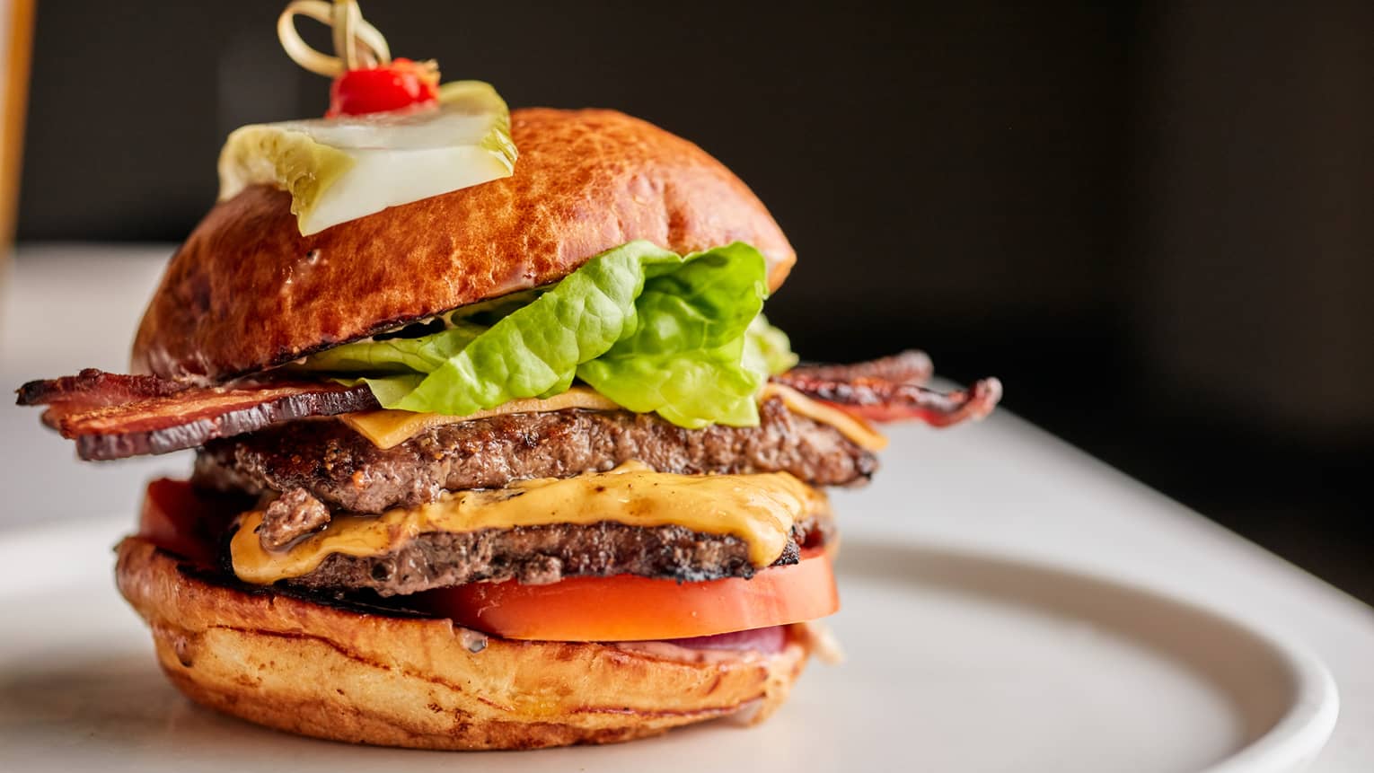 A plate with a burger on it.