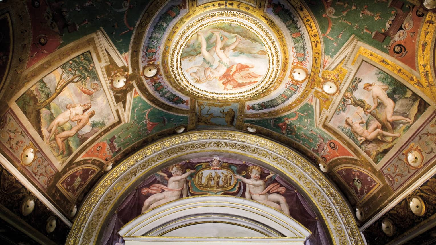 Painted murals on arched ceiling