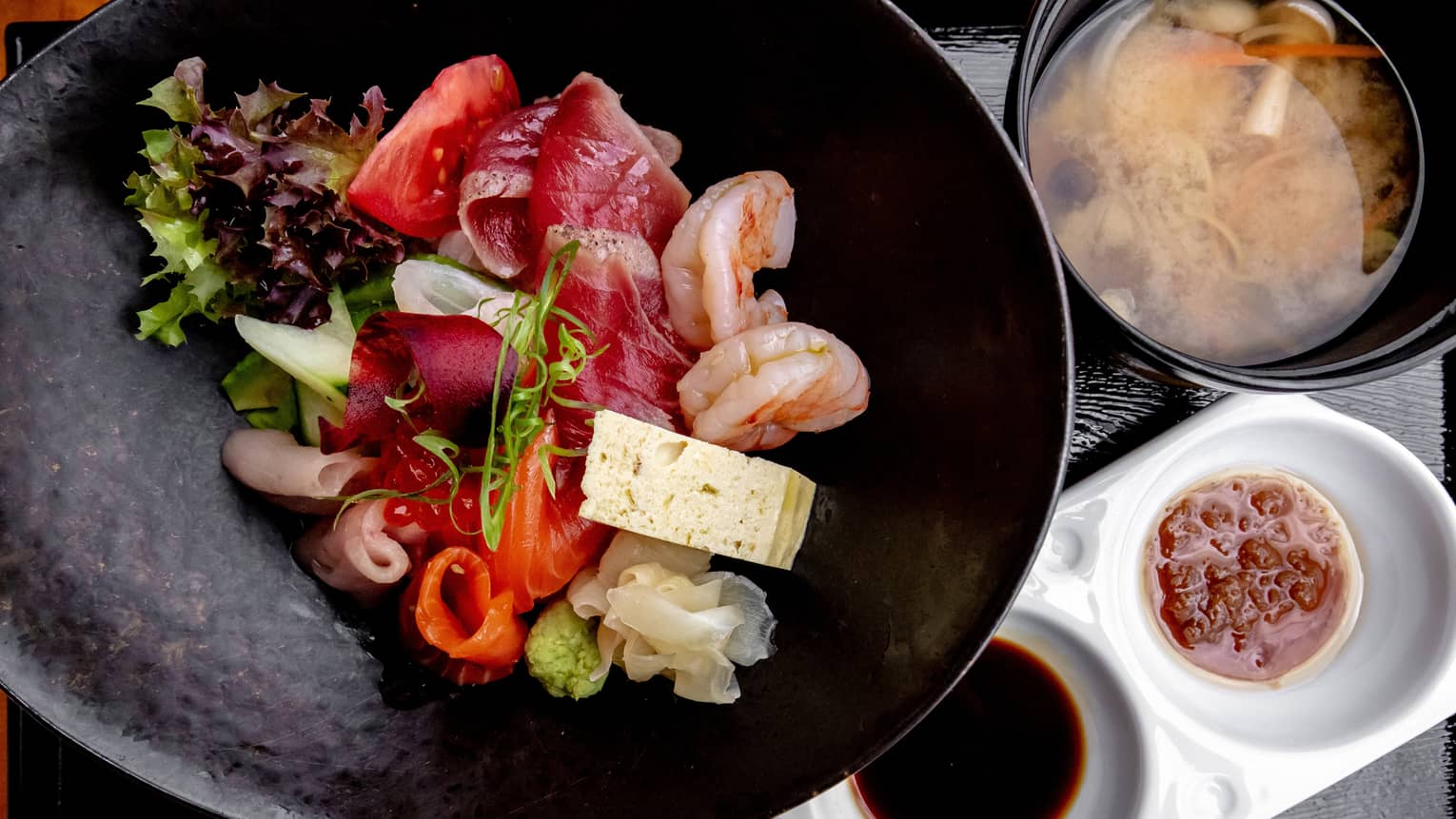 Chirashi Don, a variety of dishes including miso soup and sashimi