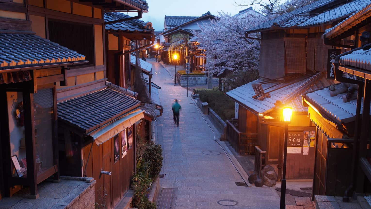 a winter scene on a shopping street in kyoto
