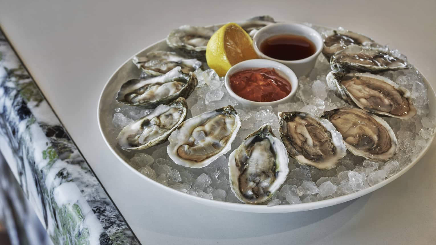 Oysters with Cocktail Sauce, Mignonette, Lemon and Saltines