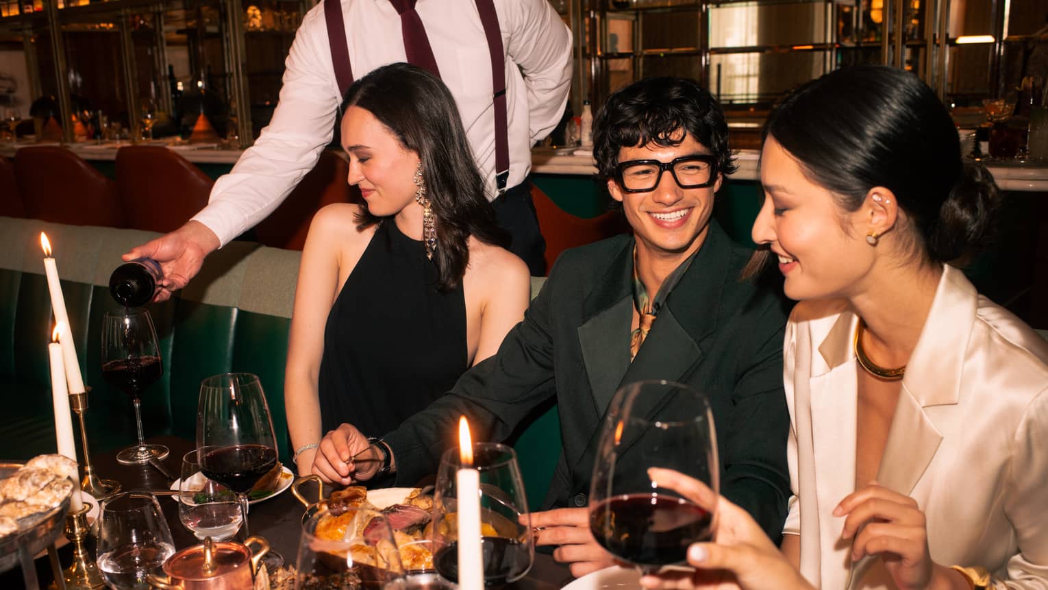 Group of friends dine at chic restaurant