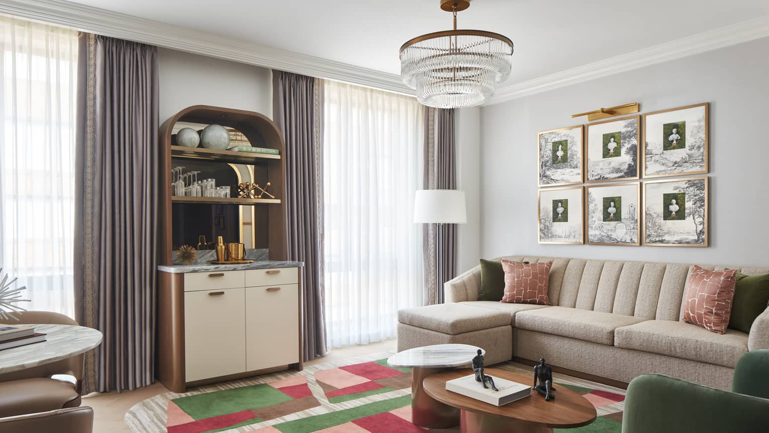 Stylish living room with sofa and wet bar of Premier Suite East Wing at Four Seasons Hotel Washington, DC