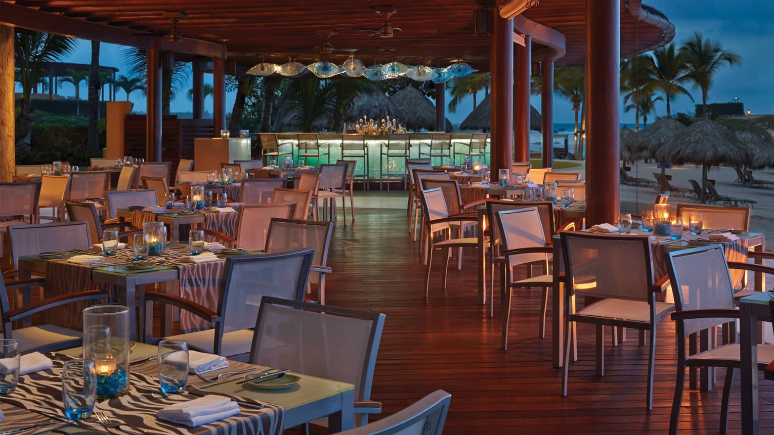 Punta Mita Restaurants Fine Dining Four Seasons Resort Bahia Seafood Restaurant Open Air Dining Room And Bar At Dusk Palm Trees