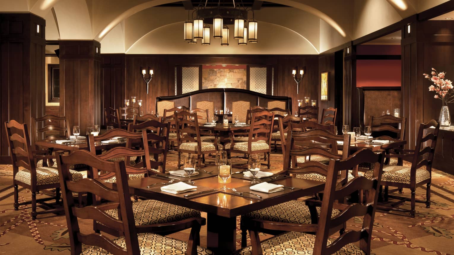 Vail Restaurants Fine Dining In Village Four Seasons Resort Flame Dining Room With Clic Wood Padded Chairs Lantern Chandelier Low Lighting