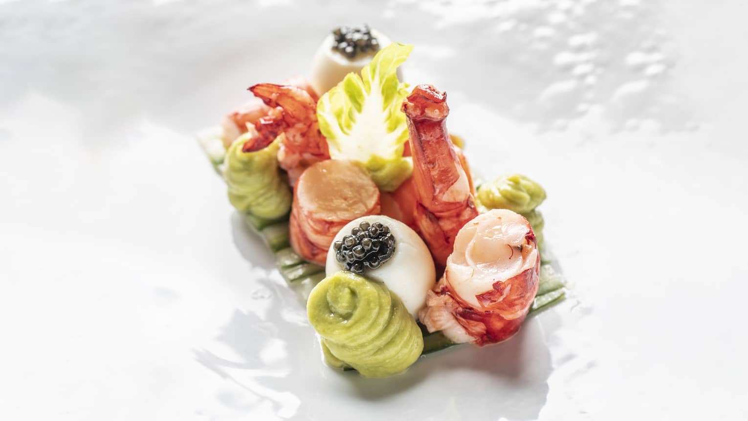 Avocado, Quail Eggs, Caviar, Espelette Pepper & Lemon Dressing