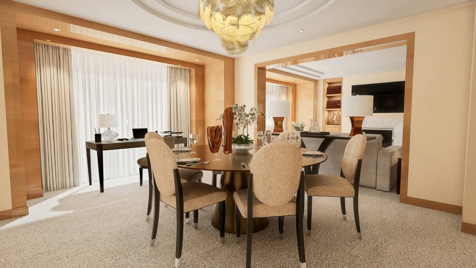 Dining room in a hotel suite, featuring a round wooden table and four upholstered chairs under a chandelier