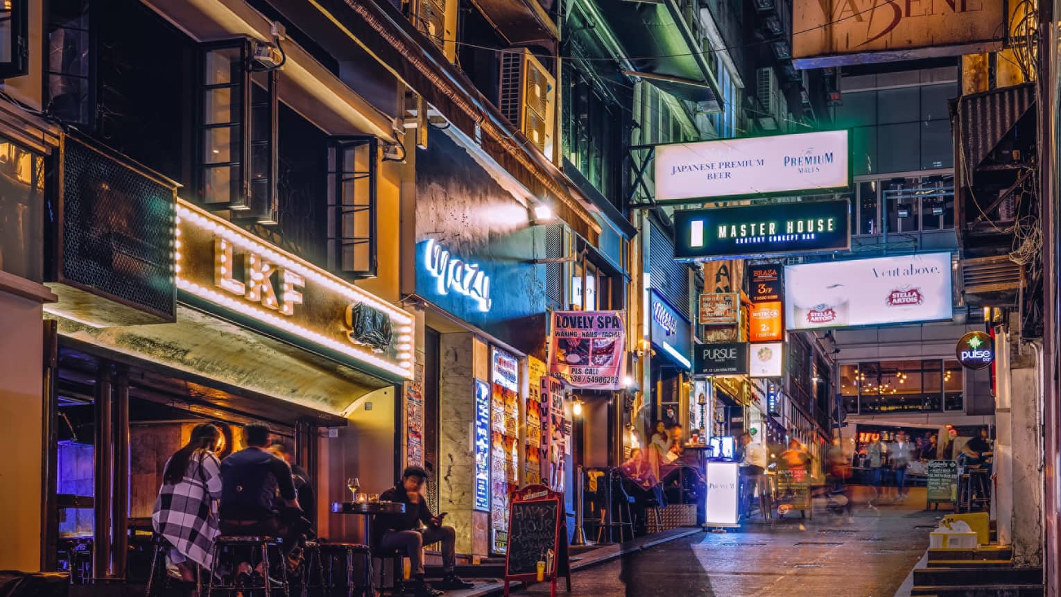 A city street at night in Hong Kong