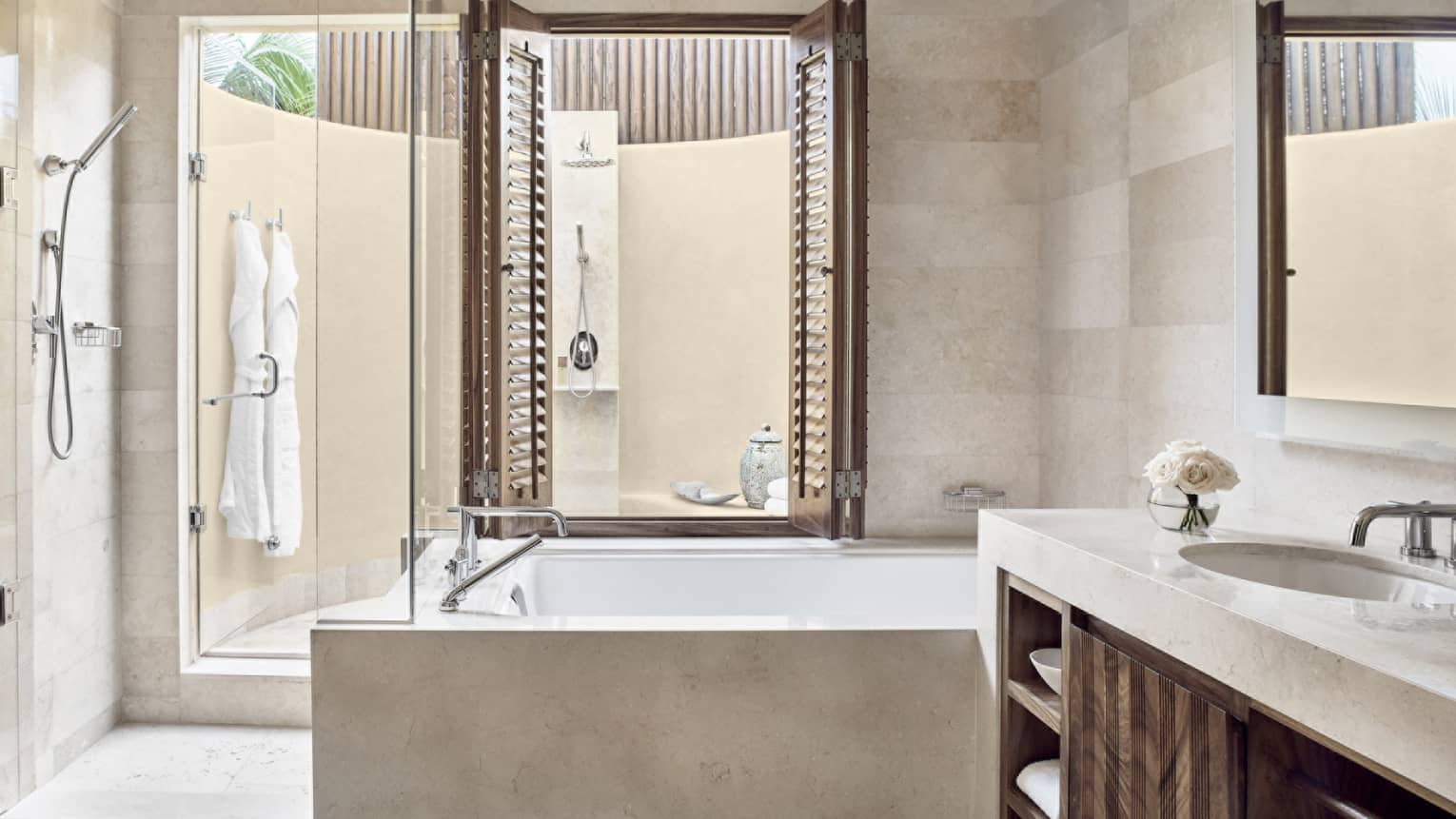 Bathroom with tub, shower and walk-out outdoor shower