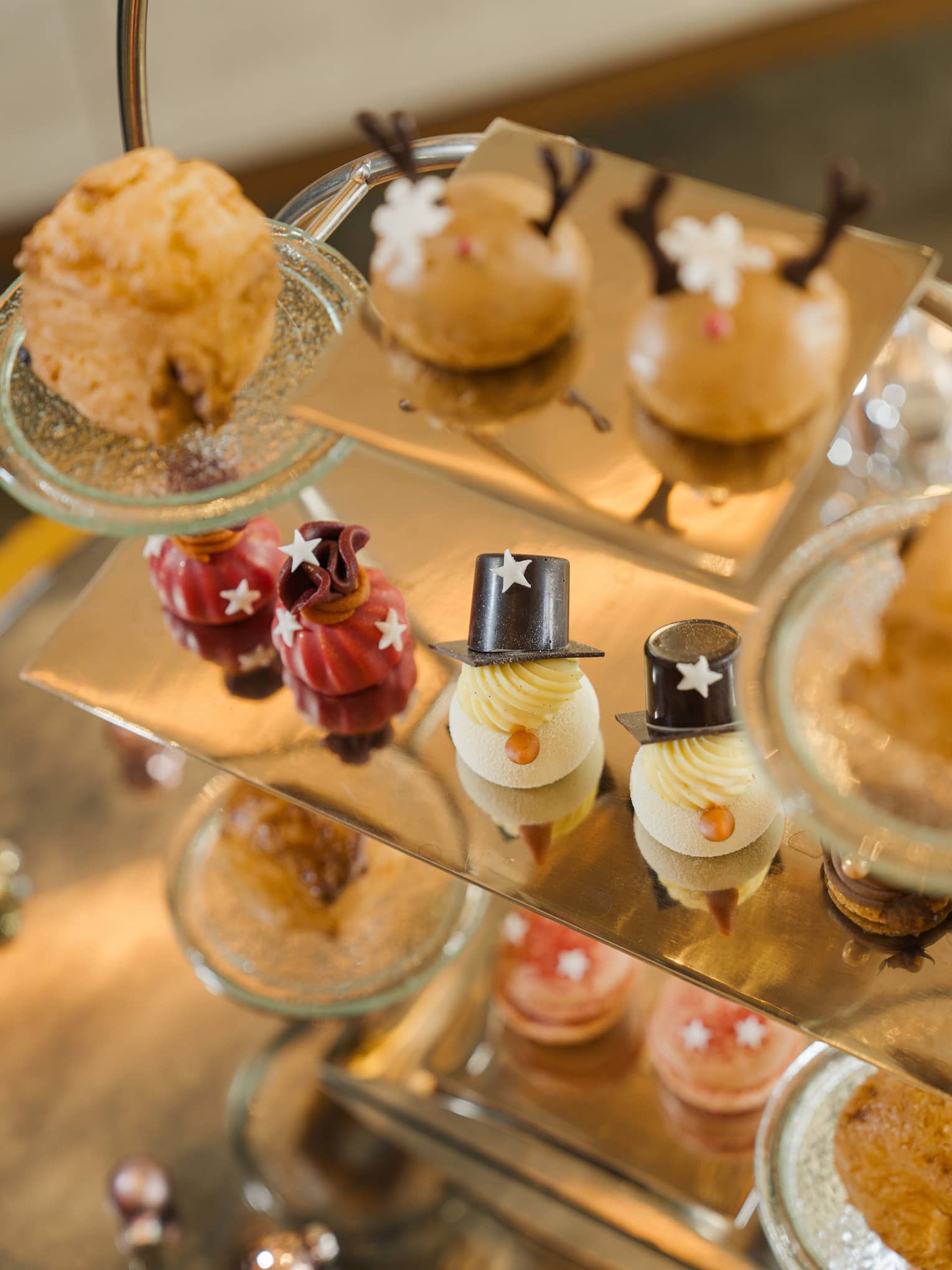 Tiered tray filled with festive afternoon tea pastries
