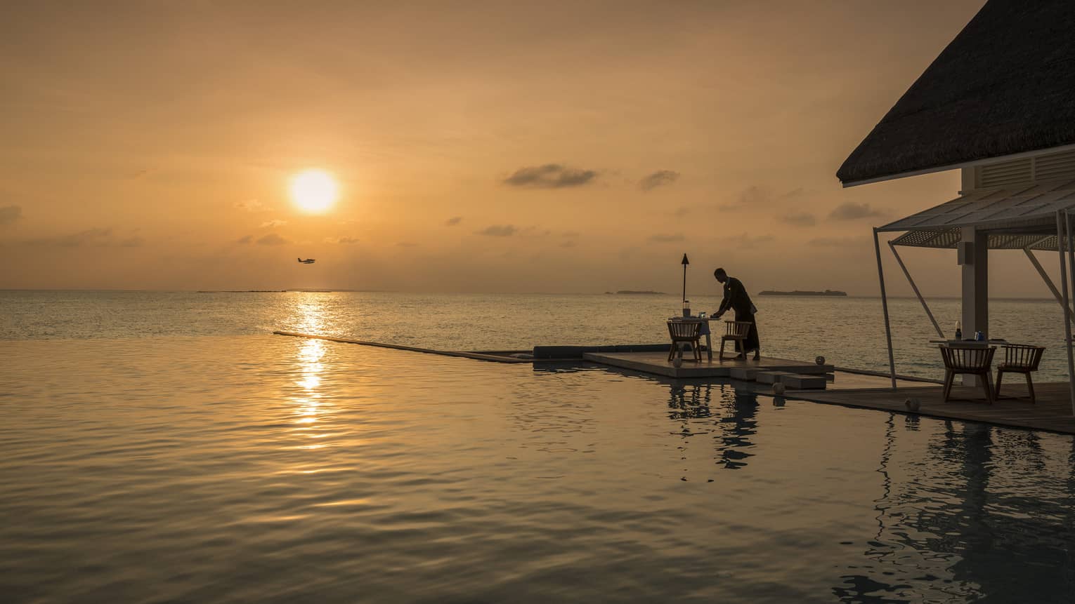An intimate sunset dinner on a a dock at the Blu Beach Club