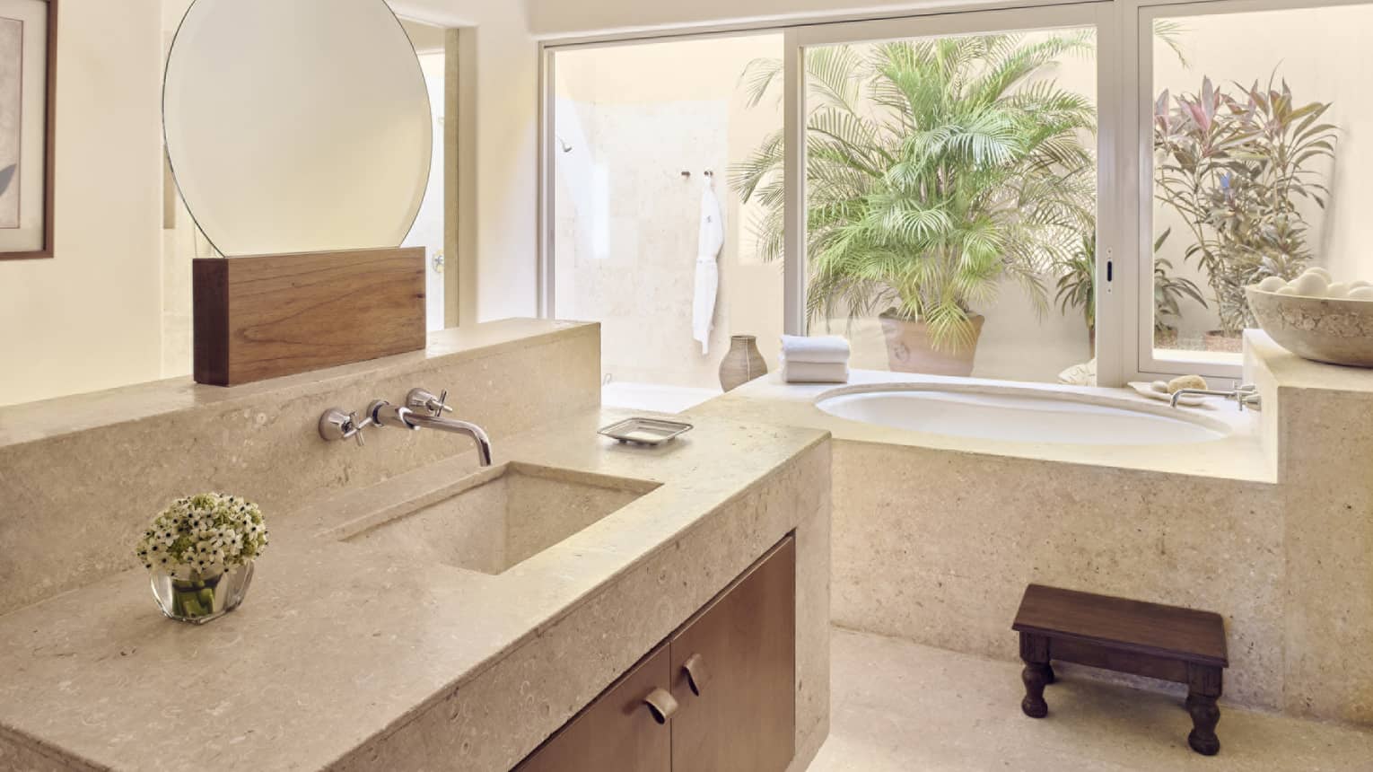 Bathroom with tub and walk-out terrace