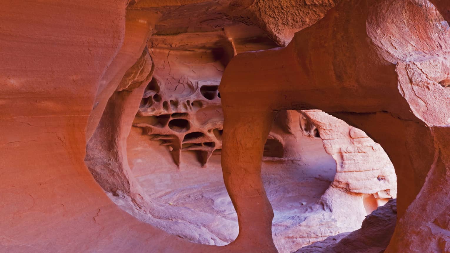 Trail through curved desert rock formations in Grand Canyon