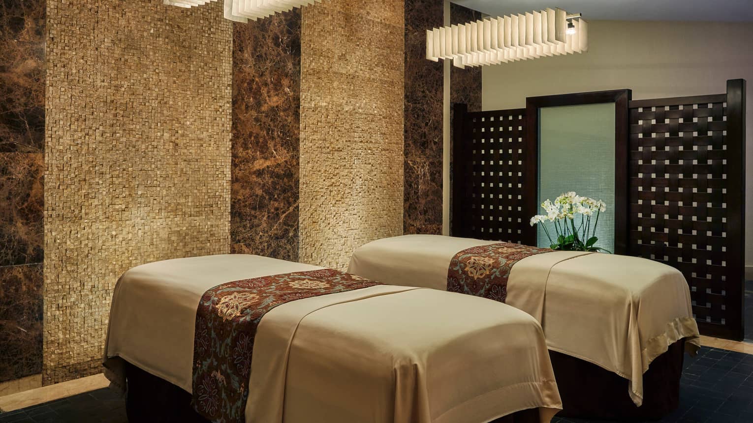 Couples massage beds side-by-side in spa
