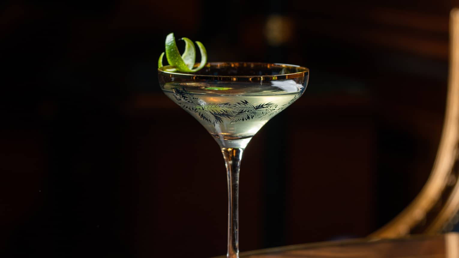 A cocktail in a stem glass.