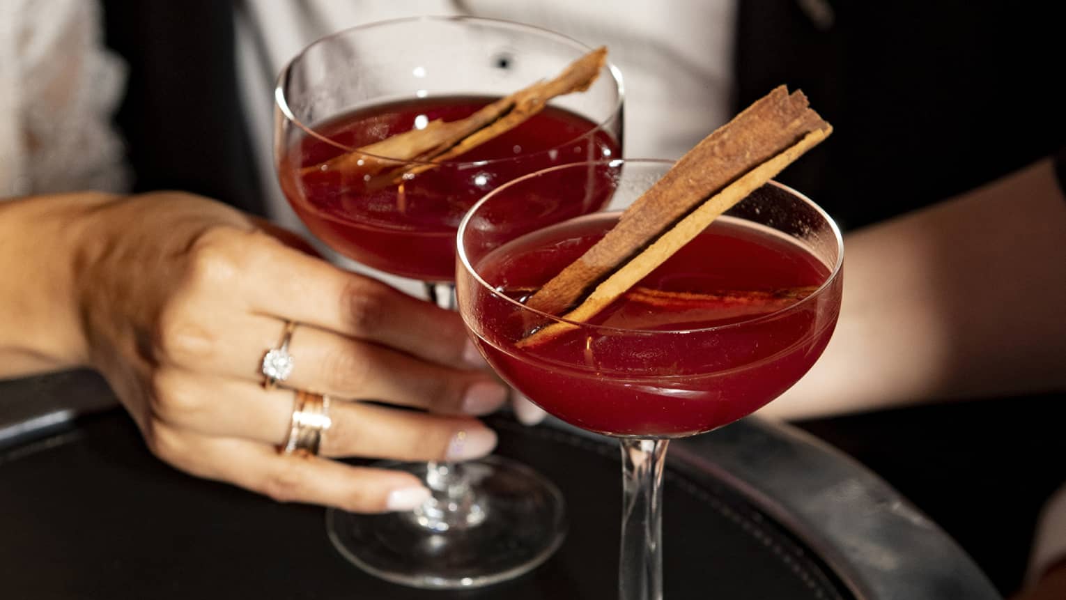 Two drinks on a tray.