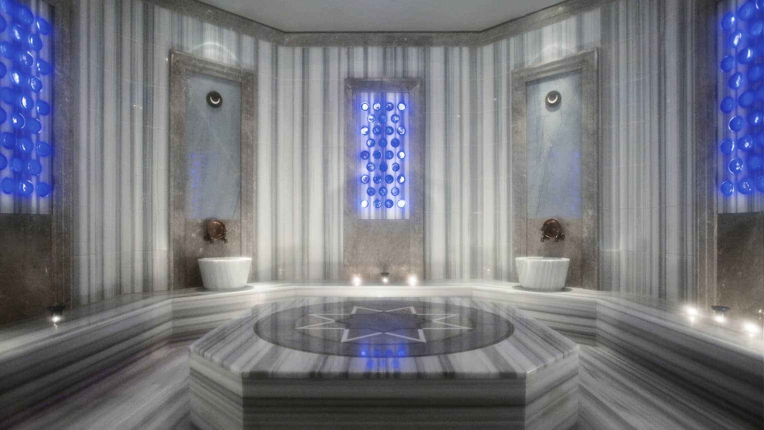 Marble Hammam spa room with candles
