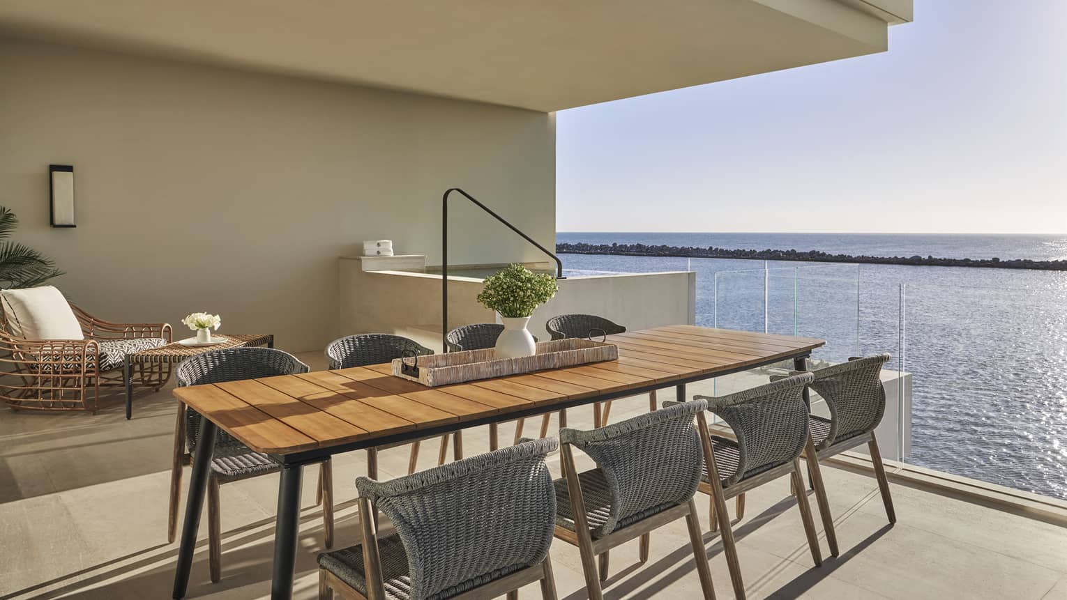 Outdoor dining table for 8, glass balcony with ocean view