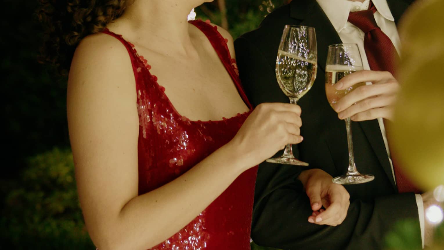 Couple holding champagne flutes