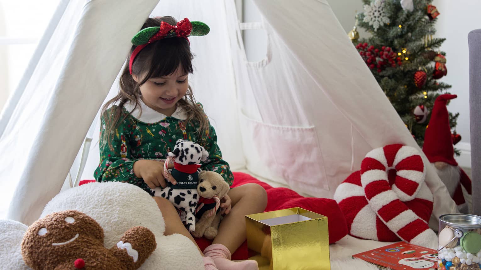 In-room glamping with festive decor