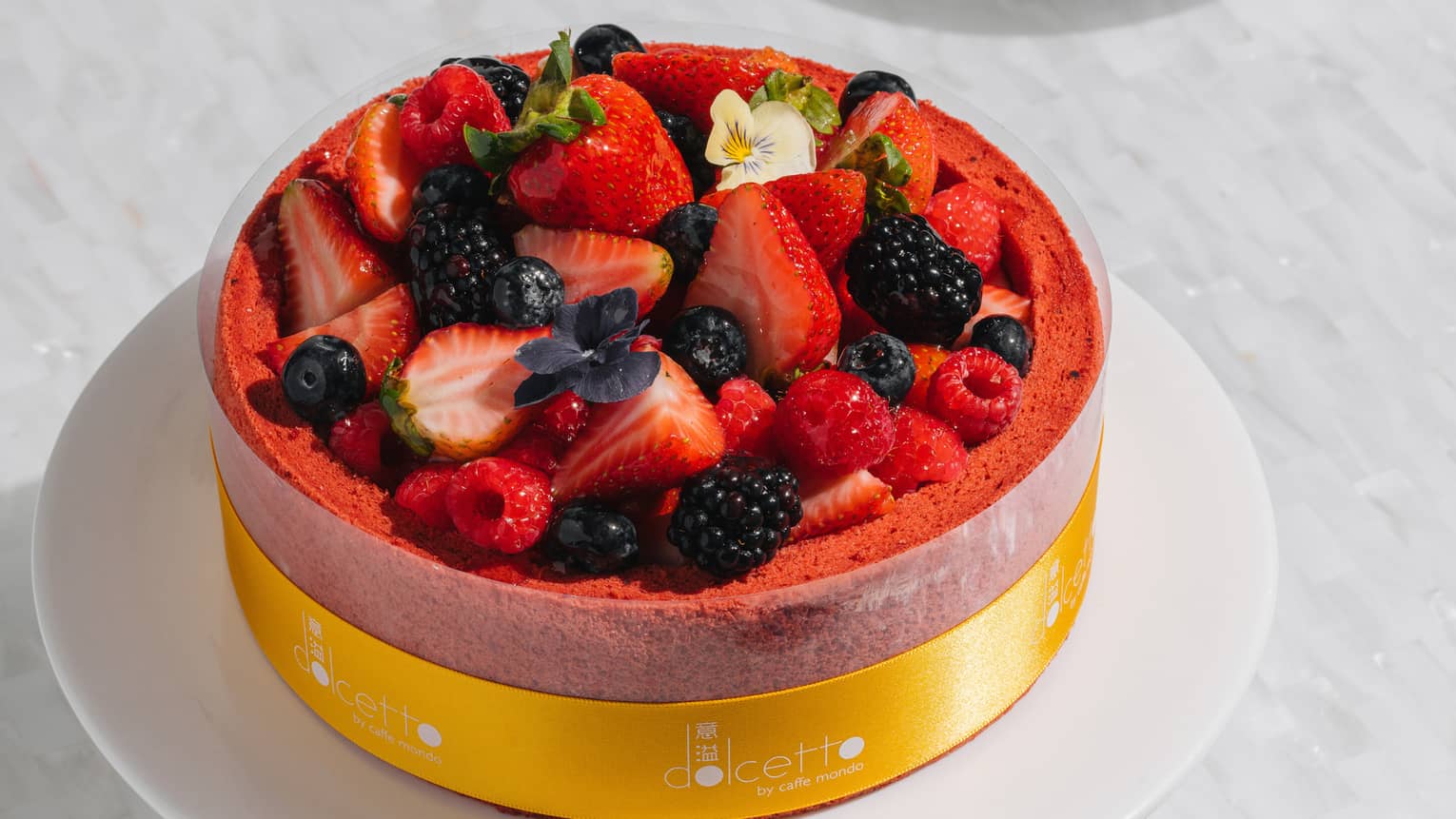 Strawberry shortcake topped with fresh berries