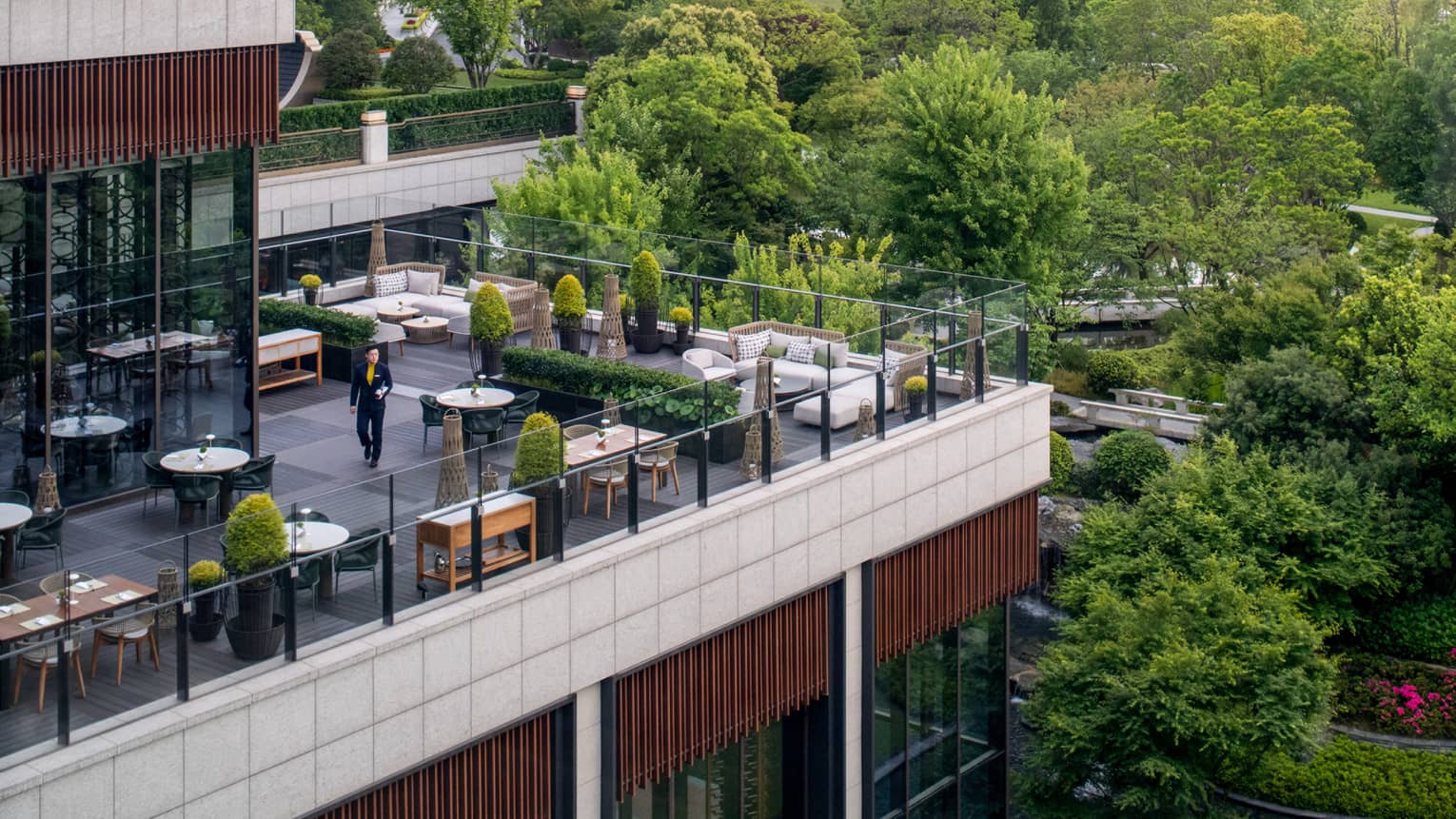 Exterior shot of elevated outdoor terrace restaurant at Four Seasons Hotel Suzhou