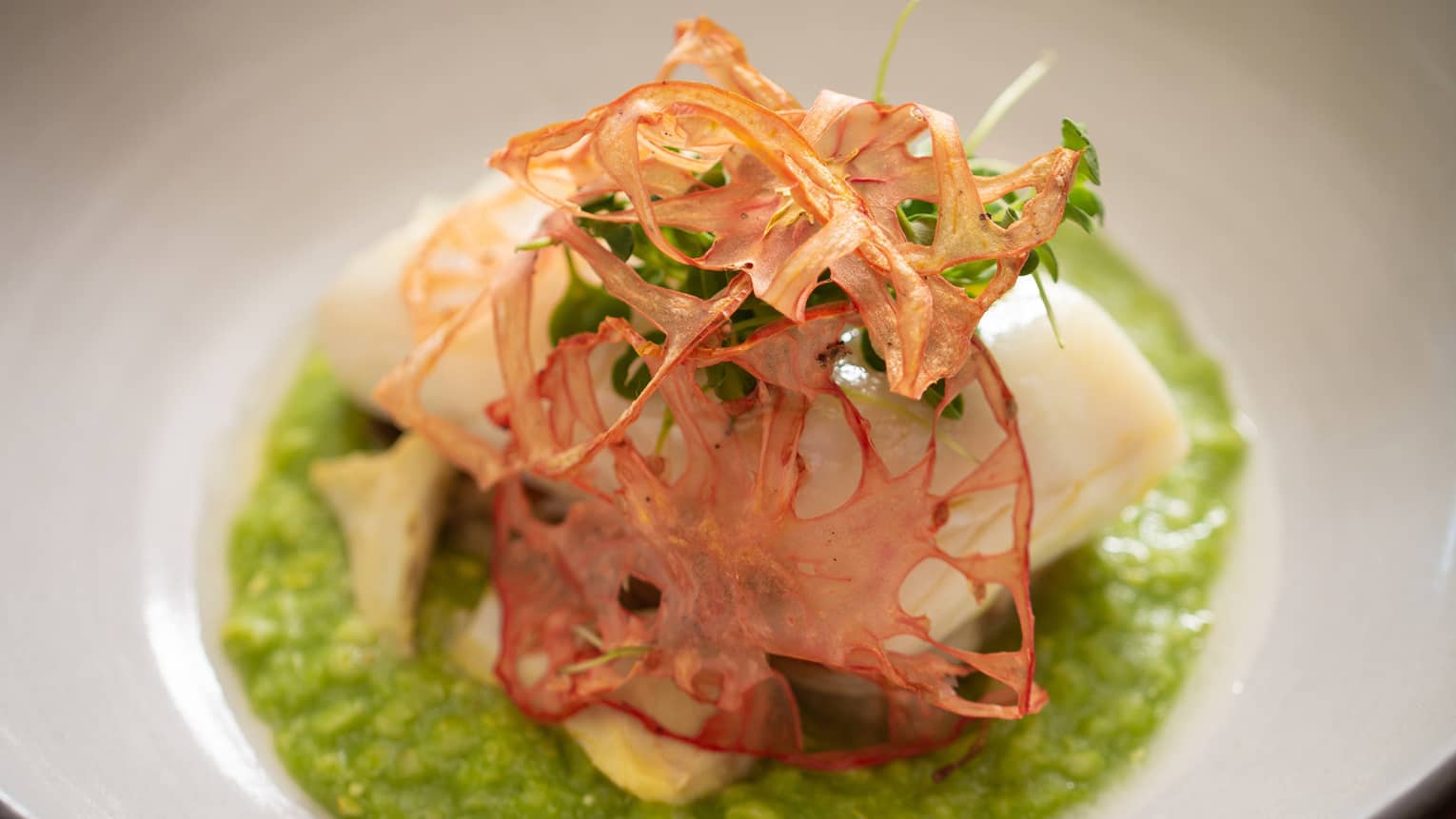 Poached fish and olive oil.
