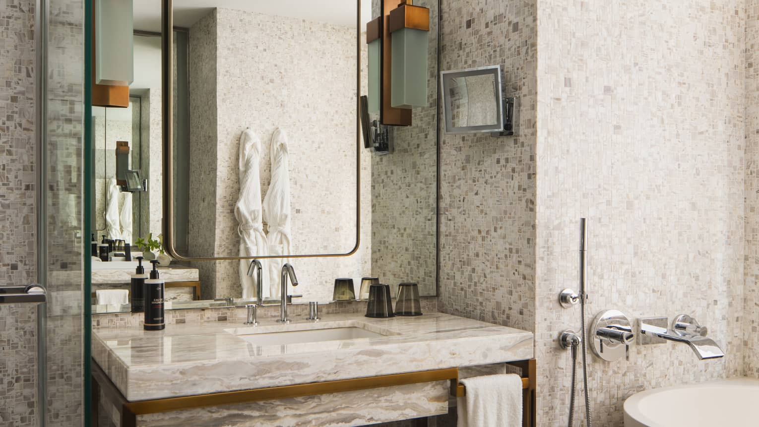 Luxury hotel marble bathroom with deep-soaking tub