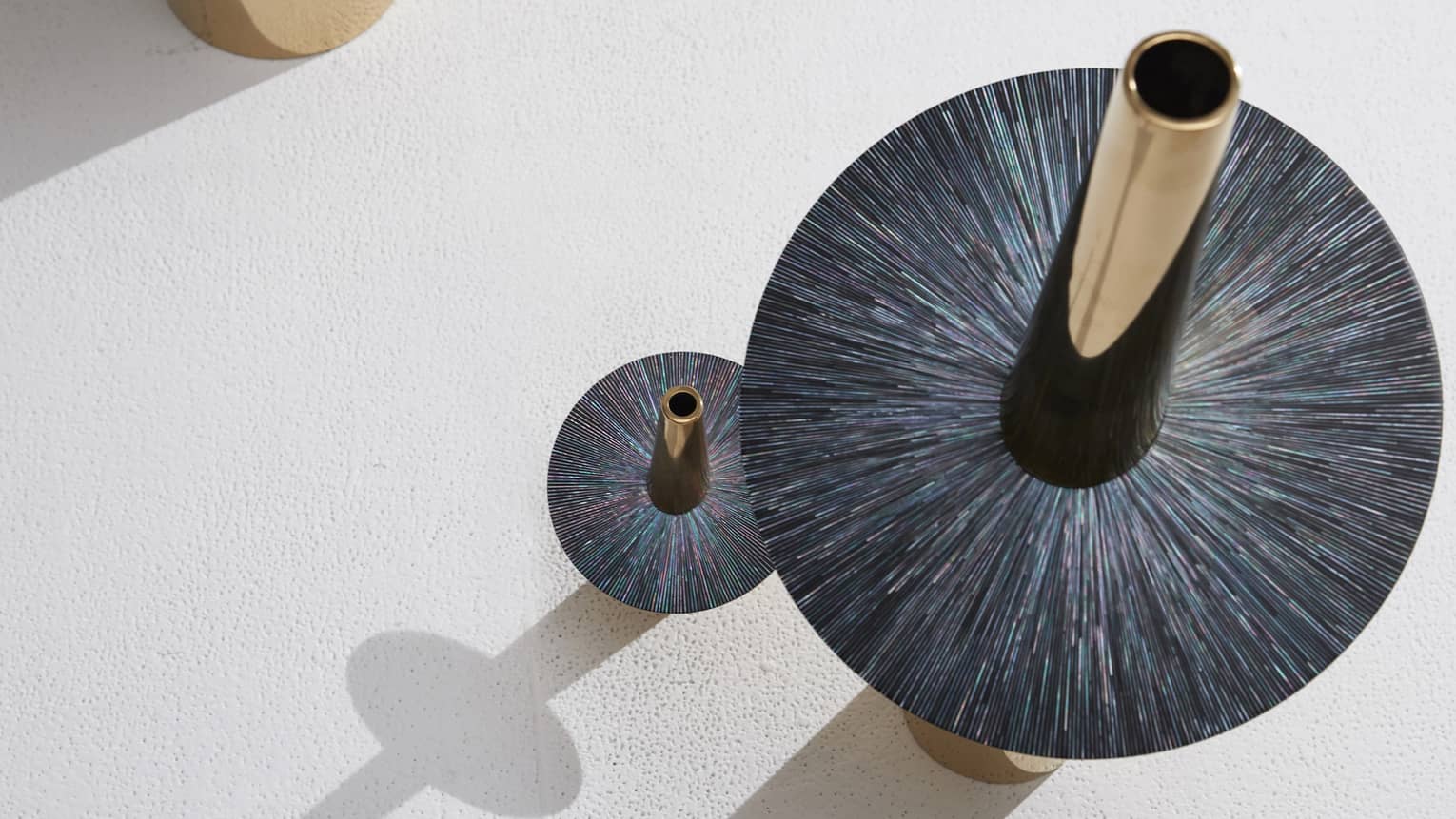 Circular artwork with a kaleidoscope of colours.