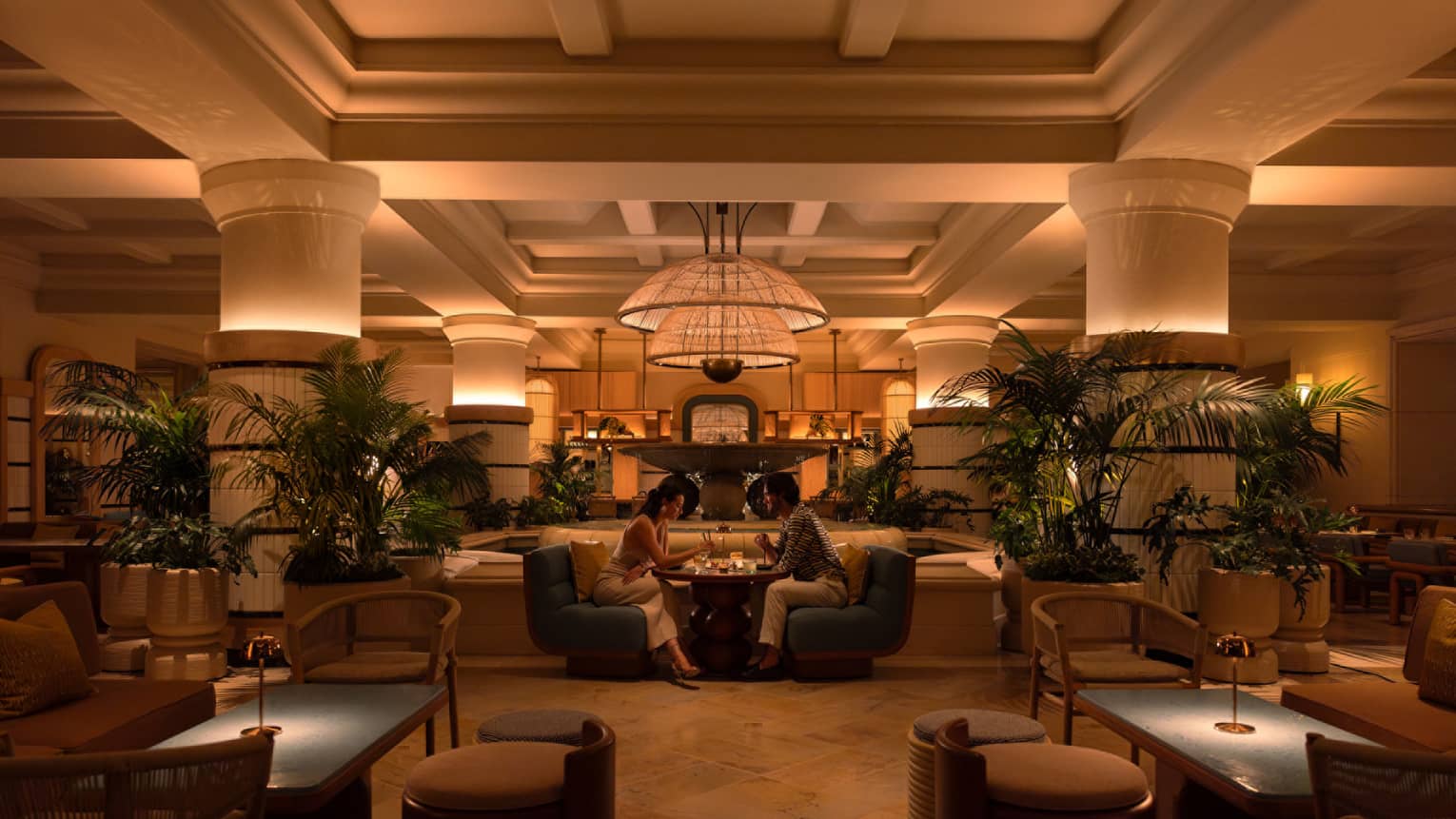 Warmly lit indoor hotel lobby lounge